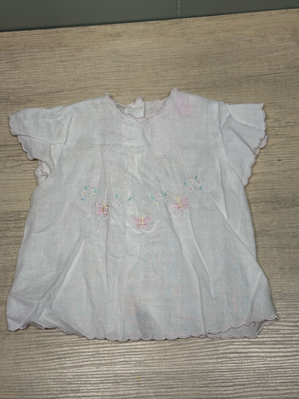 White Embroidered Baby Blouse with Pastel Butterfly Accents